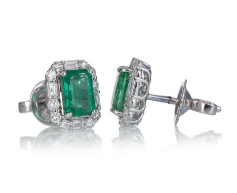 PAIR OF EMERALD AND DIAMOND CLUSTER EARRINGS, set with octagonal step cut emeralds within diamond halos, in eighteen carat wh