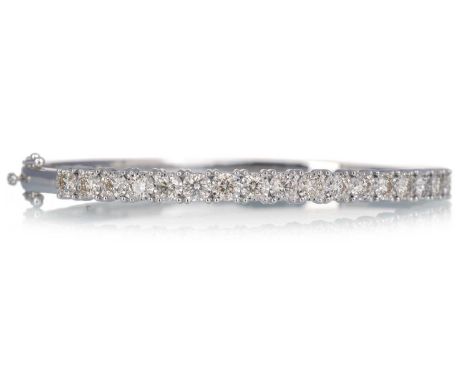 DIAMOND BANGLE, with illusion set diamonds totalling approximately 2.21 carats, in nine carat white goldQty: 11.9g