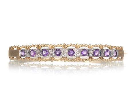 AMETHYST AND DIAMOND BANGLE, set with round amethysts interspaced by pairs of diamond chips, in nine carat goldQty: 11.4gBrac