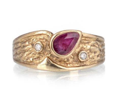 RUBY AND DIAMOND DRESS RING, set with a pear shaped ruby and flanked by bezel set diamonds, marked 375, size K 1/2Qty: 3.9g