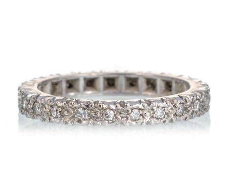 DIAMOND ETERNITY RING, the single cut diamonds totalling approximately 0.25 carats, marked 18, size K 1/2Qty: 4.1g