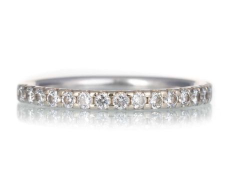 AMENDMENT: DIAMOND HALF ETERNITY RING, set with round brilliant cut diamonds totalling approximately 0.35 carats, in eighteen