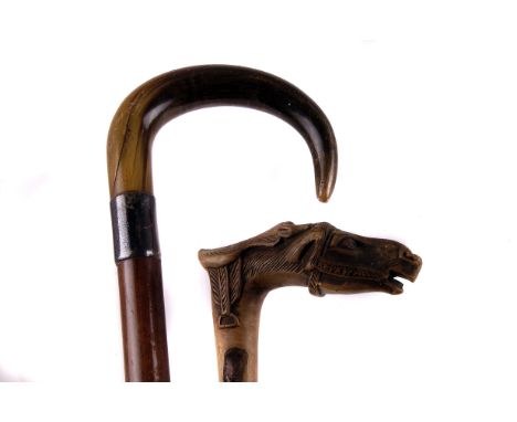 A 19th century Greek carved wooden walking stick,  the handle modelled as a horse's head, inscribed with the place name 'Kepk