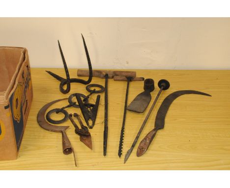 A collection of farming and farm yard tools, including sickles, borers, pinchers, a mattock and more (parcel) 