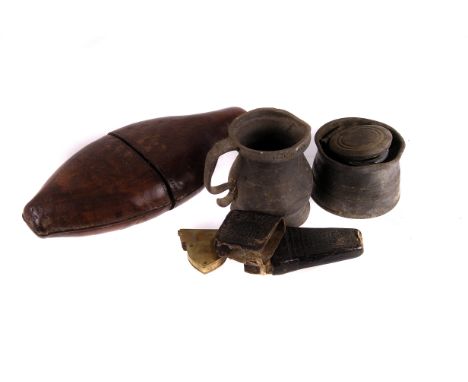 A 19th century tooled leather and glass hip flask,  in the form of a fish, together with brass mounted vet's blood letting to