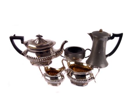 A three piece silver plated shaped oblong tea service,  with gilt interiors, together with cased plated flatware and pewter s