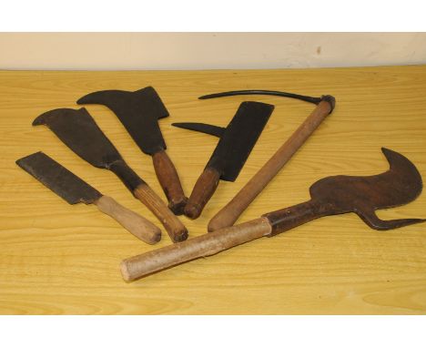 A group of vintage hand farm and other tools, including a  slate knife or Mason's Zex, a Devon style cleaver, a Bill Hook and