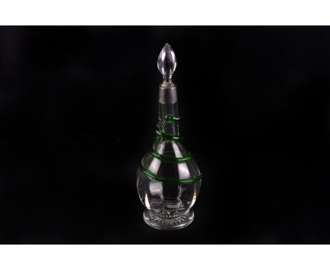 A late Victorian silver collared glass decanter, the spherical body with green glass serpent coiled about, 25cm high
Conditio