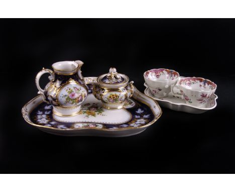 A 19th century Staffordshire serpentine tea tray, with matching cups, plus a 19th century Paris porcelain part bachelor's tea