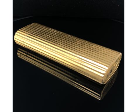 A CARTIER PARIS VINTAGE GOLD PLATED LIGHTER, 6397. HEIGHT 7cms. 