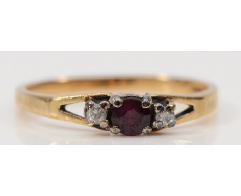 A 9ct gold vintage ruby and diamond three stone ring, claw set, N, 1.7g 
