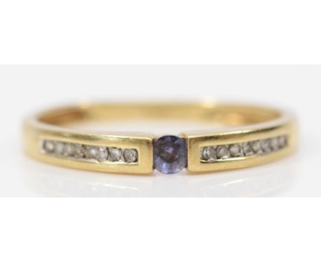 A 9ct gold tanzanite and diamond ring, channel set, R, 1.6g 