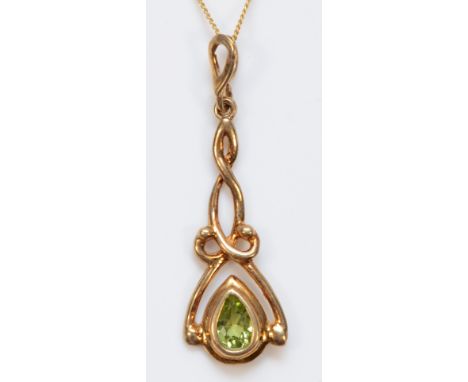 A 9ct gold pear cut peridot Celtic style pendant with necklace, 35mm pendant, 1.8g 