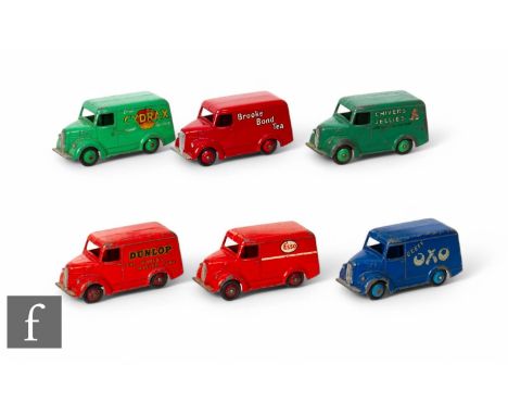 A group of Dinky diecast Trojan vans, numbers 450 to 455, ESSO, Dunlop, Chivers Jellies, OXO, Cydrax and Brooke Bond Tea, all