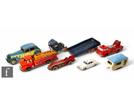 A selection of tinplate toys including Mettoy clockwork Rolls Royce, Marx fire engine, clockwork articulated truck and traile