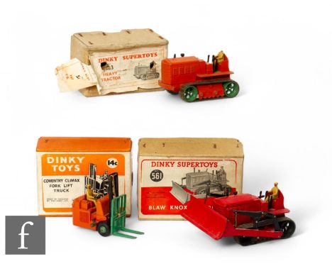 Three Dinky diecasts, 561 Blaw Knox bulldozer with red body and black tracks and 563 Heavy Tractor orange body without dozer 