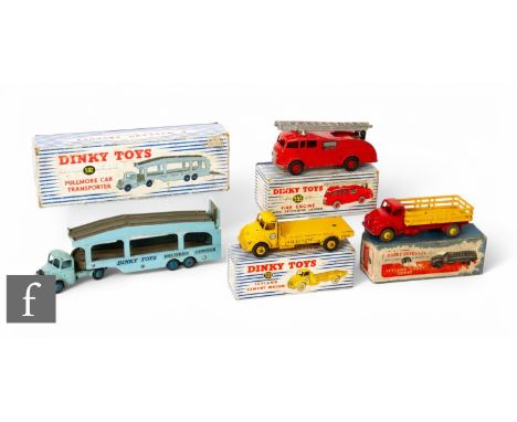 Four Dinky diecasts, 531 Leyland Comet lorry, red cab and chassis with yellow stake body and wheel hubs, with poor box lid, w