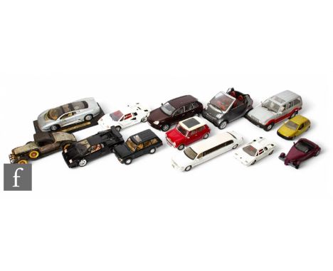 A selection of assorted large scale diecast models including Burago, Maisto, Road Legends and others, unboxed. (13)
