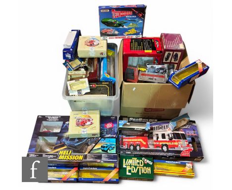 A large collection of assorted diecast model empty boxes including Corgi, Britain's, Sun Star, Burago, BigTrak, Maisto and ot