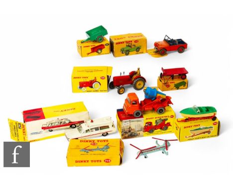 A collection of Dinky diecasts, 960 Lorry-Mounted Concrete Mixer, 267 Superior Cadillac Ambulance, 715 Bristol 173 Helicopter