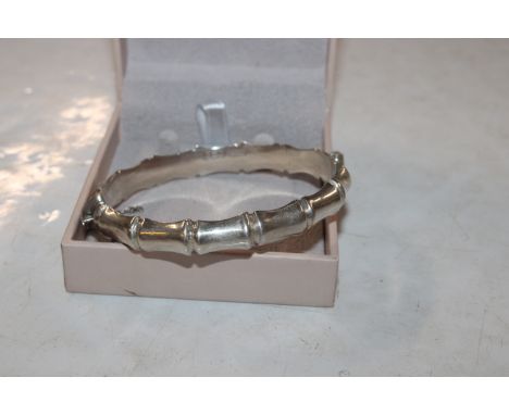 A 1968 Henry Griffiths Sterling silver bamboo effect bangle, approx. 14.5gms 
