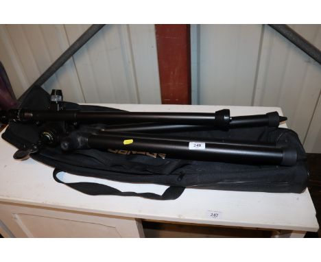 A camera tripod and carrying bag