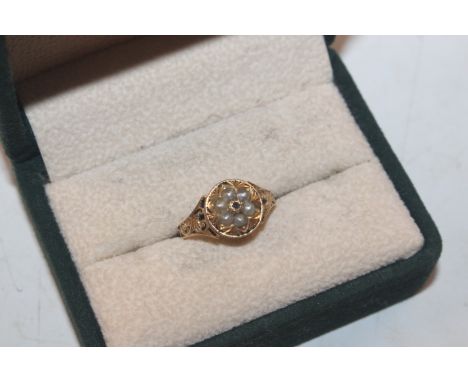 An antique 15ct gold ring, set with chip diamond and seed pearls, ring size L/M, approx. total weight 2.8gms 
