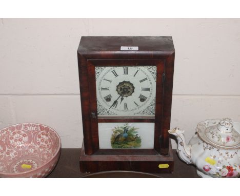 An American mahogany cased mantel clock with decorative opaque glass panel depicting game birds 