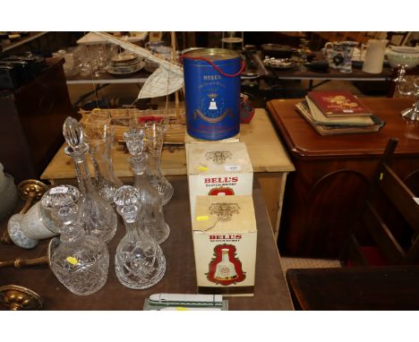 Four Royal Commemorative Bells scotch whisky decanters (boxed and unopened)