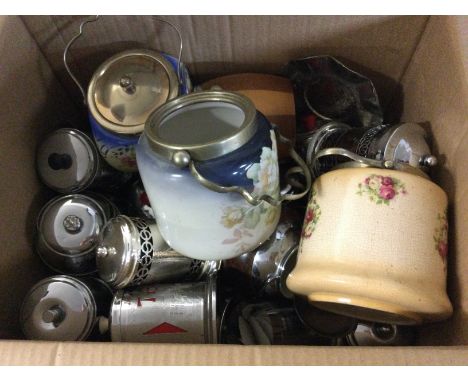 A large collection of chrome tea and sugar storage jars and ceramic biscuits barrels. Postage D. NO RESERVE