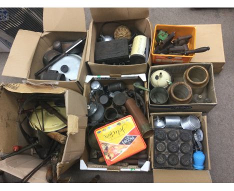 A large collection of vintage kitchen ware items including pots, rolling pin, irons etc