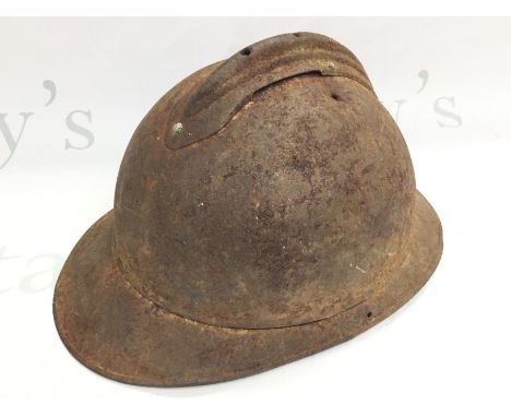 A French WW1 Adrian helmet with no liner. Postage category C