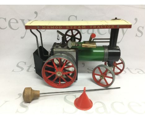 A Mamod steam tractor, comes with box. Shipping category D.