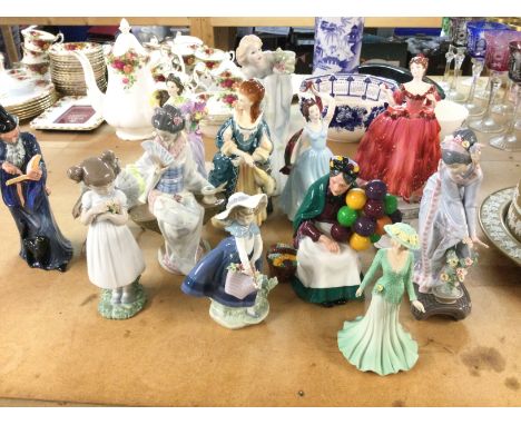 A collection of 13 ceramic figurines including Lladro Royal Doulton etc.