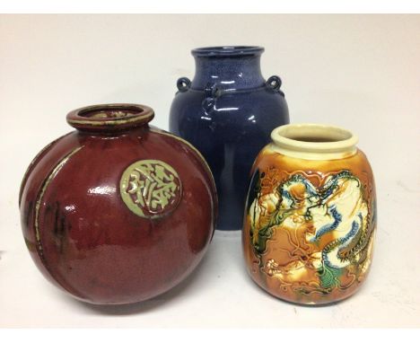 Three Chinese Export ceramic 20th century vases one with raised relief with dragons and caricature marks to the base Hight 18