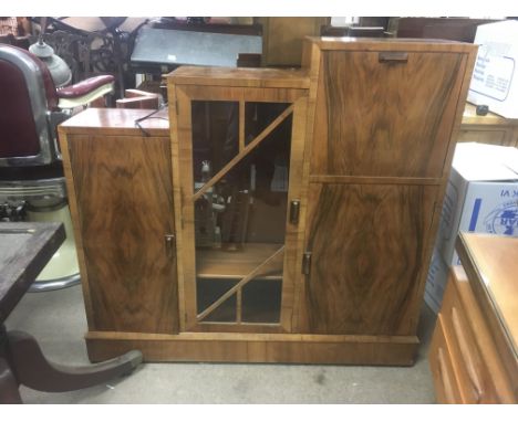An Art Deco step design display cabinet.