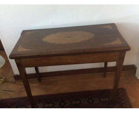 An Early 19th century inlaid card table.