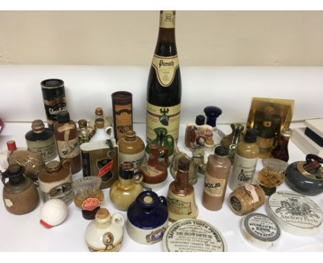 A collection of miniature ceramic bottled whiskys and other spirits a Vintage bottle of 1980 Ruster Trockenbeerenausleese Aus
