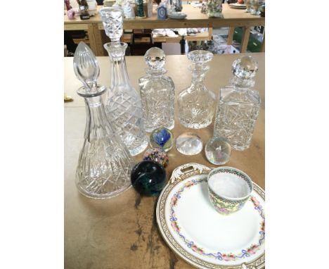 A collection of cut glass decanters, paperweights, a modern Chinese small vase and a ceramic dish. This lot cannot be posted.