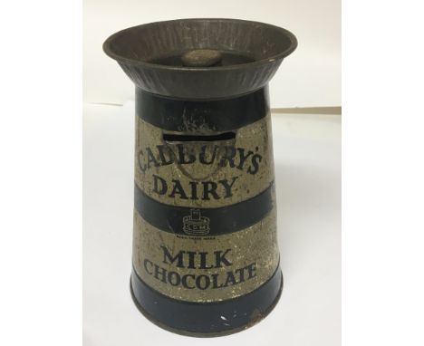 A Vintage Cadburys Dairy Milk Chocolate money box tin in the form of a decorated milk churn. Hight 14cm