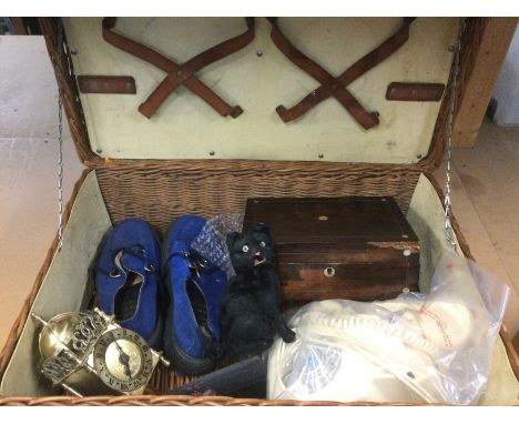 A wicker basket and contents, 8 day wall clock and a Lloyd Loom corner basket. Shipping category D.