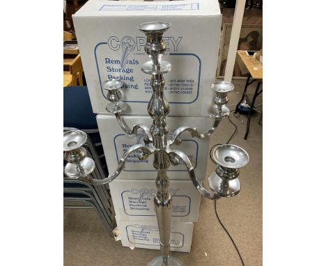 A modern standing four branch candelabra.