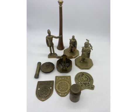 A selection of brass military items, trench art lighter, brass compass, 3 figurines, brass &amp; copper horn,
