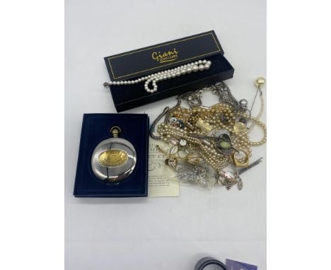 A box lot of costume jewellery, Dalvey travel alarm clock, 