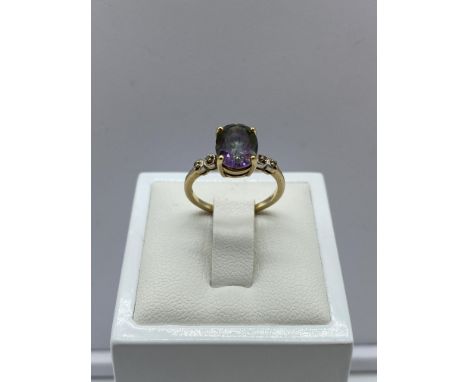 A 9ct yellow gold mystic stone &amp; diamond dress ring, 2.2 grams in weight approx, size J