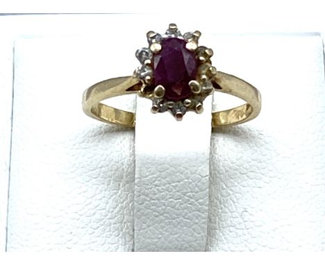 A 14ct gold ruby &amp; diamond dress ring, size J, weight approx 1.8 grams 