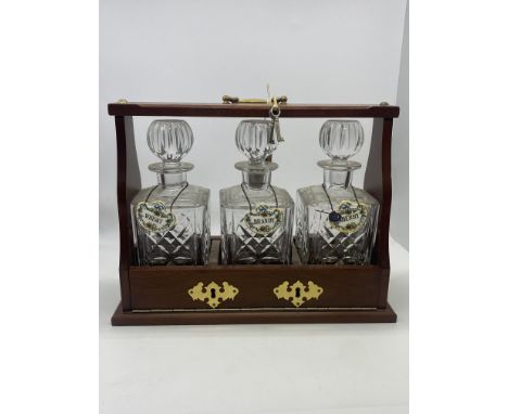 A tantalus with crystal decanters &amp; coalport name plates, no chips or cracks 