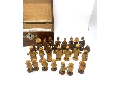 A vintage Nigerian thorn wood chess pieces and box, 31 pieces, incomplete &amp; damaged, 1 knight is missing an arm, a bishop