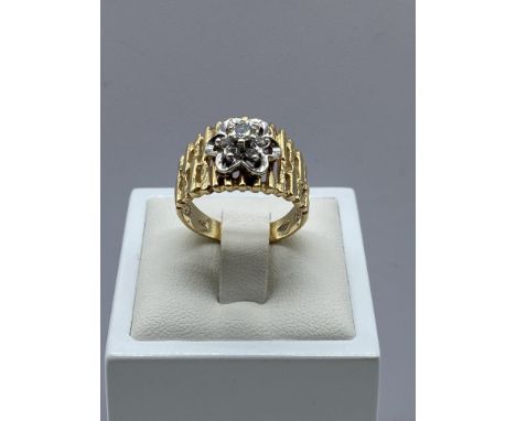 A 14ct yellow gold diamond daisy cluster ring, 7.1 grams in weight approx, size P