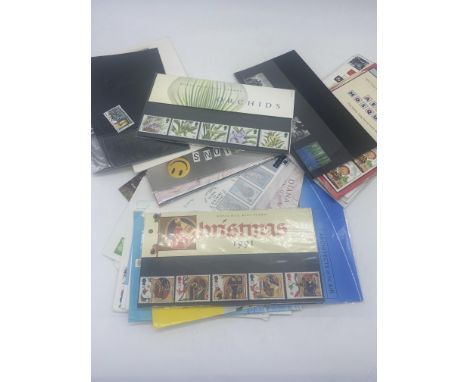 A collection of first day cover stamps and others